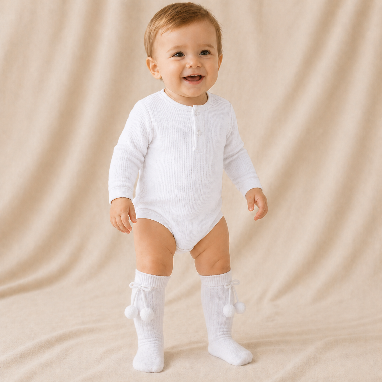 White Celine Baby Socks with pom pom ties